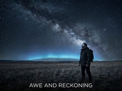 Pluto in Aquarius 2026 effects on each zodiac sign — lone figure standing at night under a vast electric blue starfield, transformative cosmic atmosphere